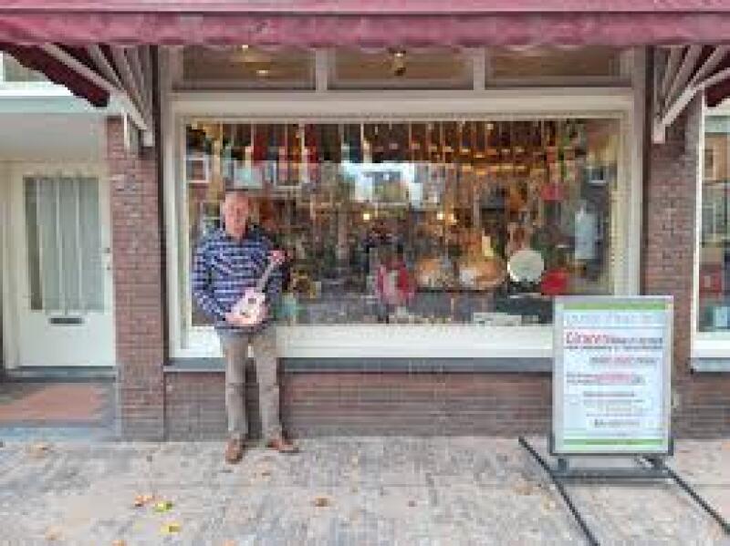 Guitarshop met Boy op het Kleedje