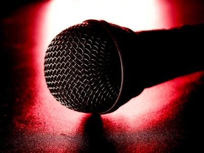 close up of black microphone on a red light and bl 2022 12 16 03 13 31 utc